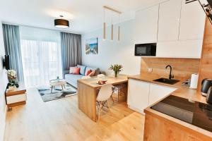 Kuchyň nebo kuchyňský kout v ubytování Apartamenty Baltic Sea Maczka 13