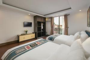 TV a/nebo společenská místnost v ubytování Quiet Sapa Hotel