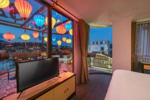 TV a/nebo společenská místnost v ubytování Quiet Sapa Hotel