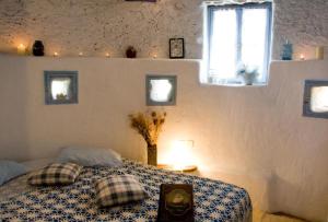 Llit o llits en una habitació de Windmill Studios
