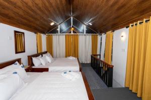 Ένα ή περισσότερα κρεβάτια σε δωμάτιο στο Prime England Cottages