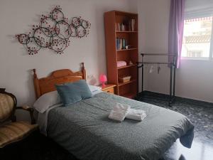 Postel nebo postele na pokoji v ubytování Mi Carmela