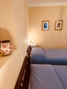 Postel nebo postele na pokoji v ubytování Villa Corti Lakeview