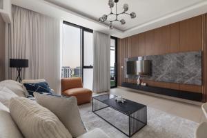 Posezení v ubytování Sahab - Misk 1BR Apt -High Floor