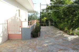 A garden outside Rentoulia Apartments