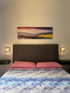 A bed or beds in a room at Hotel Villa Mare