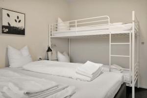Postel nebo postele na pokoji v ubytování Hotel Varde