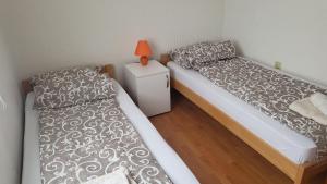 Postel nebo postele na pokoji v ubytování Villa Nesh
