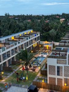 an aerial view of a building with a pool at Casa cocais Atins in Barreirinhas