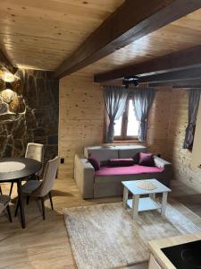 A seating area at Apartments Bogdanović