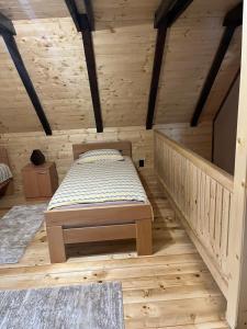 A bed or beds in a room at Apartments Bogdanović