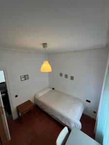 Cama o camas de una habitación en Roomin Hostel