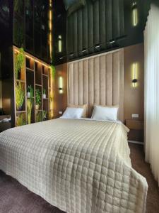 Ένα ή περισσότερα κρεβάτια σε δωμάτιο στο Harmony Apartments