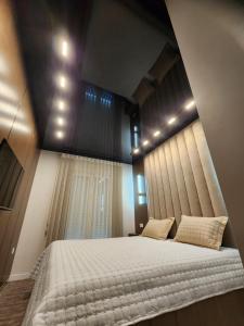 Ένα ή περισσότερα κρεβάτια σε δωμάτιο στο Harmony Apartments
