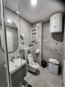 Ένα μπάνιο στο Harmony Apartments
