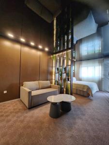 Ένα ή περισσότερα κρεβάτια σε δωμάτιο στο Harmony Apartments