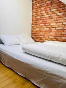 Posteľ alebo postele v izbe v ubytovaní Apartamenty Baltic Sea Wieniawskiego