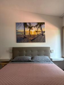 A bed or beds in a room at Hotel Villa Mare