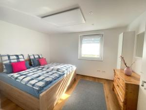 Postel nebo postele na pokoji v ubytování Ferienwohnung Kostecki