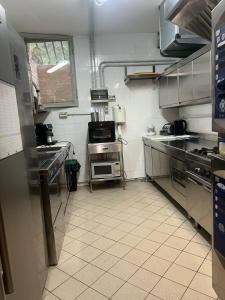 A kitchen or kitchenette at Amoliv