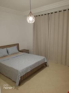Postel nebo postele na pokoji v ubytování WS Home
