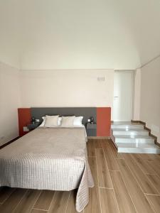 En eller flere senge i et værelse på Umbrella House