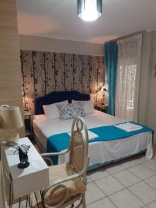 Postel nebo postele na pokoji v ubytování Ολόκληρο διαμέρισμα fully equipped apt dora comfortable holidays on the beach 50m + 37 fotografií