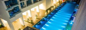an overhead view of a swimming pool in a building at Trefoil in Setia Alam