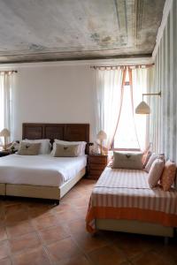 Łóżko lub łóżka w pokoju w obiekcie Al Castello Resort