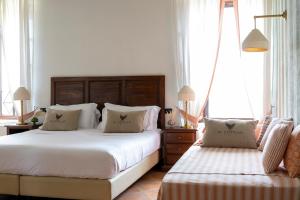 Łóżko lub łóżka w pokoju w obiekcie Al Castello Resort