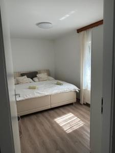 Letto o letti in una camera di Urban Stay Kremsmünster Premium Apartment