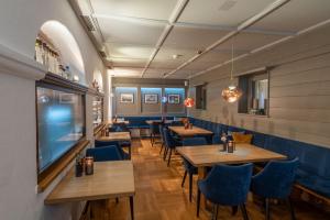 TV a/nebo společenská místnost v ubytování Terofal Hotel Schliersee - Komplett neu renoviert