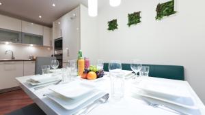 Kuchyň nebo kuchyňský kout v ubytování TEMPORA Homes - Serviced Apartments Neuwaldegg