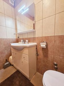 Koupelna v ubytování Apartmani Neva Supetar + 37 fotografií