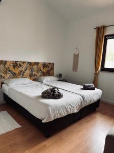 Posteľ alebo postele v izbe v ubytovaní Casa Lara
