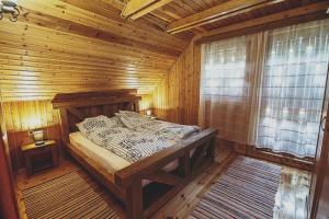 Postel nebo postele na pokoji v ubytování Csodál-Lak