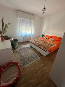 Postel nebo postele na pokoji v ubytování Villa Serena B&B Seren del Grappa