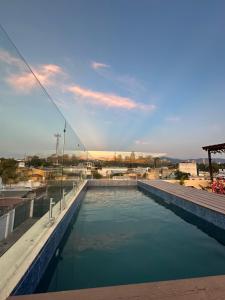 a canal of water with a city in the background at Sky Garden in Guatemala
