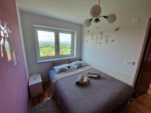 Postel nebo postele na pokoji v ubytování Vineyard Cottage with Private Jacuzzi