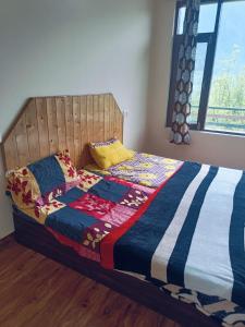 Posteľ alebo postele v izbe v ubytovaní Manalitelugucottages
