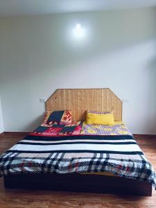 Posteľ alebo postele v izbe v ubytovaní Manalitelugucottages + 1 fotografia