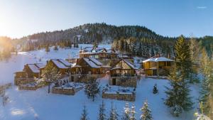 an aerial view of a resort in the snow at Malesia Eko Resort in Peje