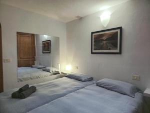 Posteľ alebo postele v izbe v ubytovaní La Orotava vacational rental home