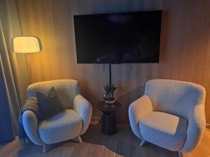 TV a/nebo společenská místnost v ubytování Storm Hotel Senja