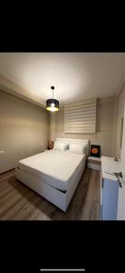 Katil atau katil-katil dalam bilik di Marina Bay Apartament 1 +10 gambar