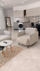 O bucătărie sau chicinetă la Chic et Zen luxe appart Algérie