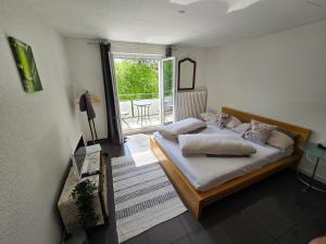 Rúm í herbergi á Eco Home
