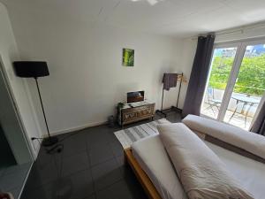 Rúm í herbergi á Eco Home