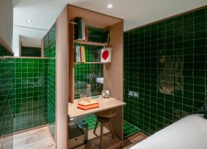 Baðherbergi á GRAACE House Suites