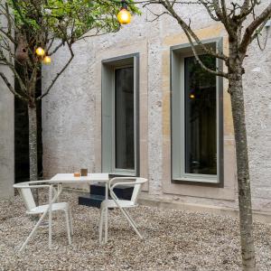 Innanhússgarður eða útisvæði á GRAACE House Suites